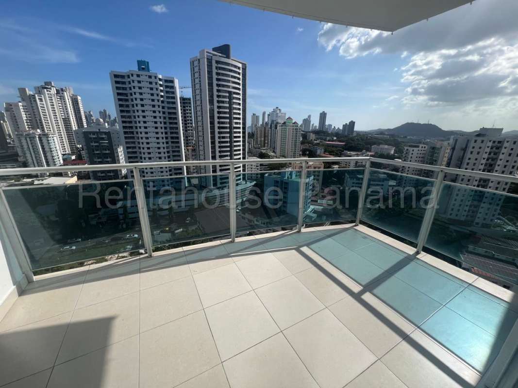Bathroom with marble tiles, glass shower enclosure, and vanity in PH Mont Royale Panama