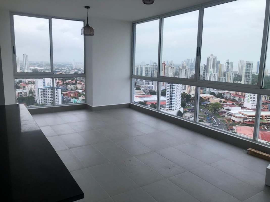 Unfurnished bedroom with large window, built-in closet, ceramic tiled floors and urban views PH Loma Vista Tower Panama