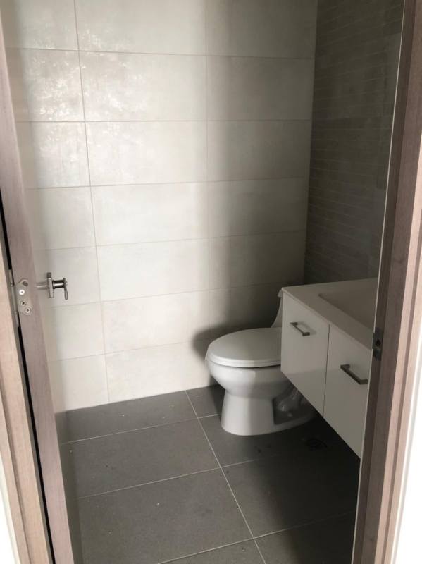 Kitchen with white cabinetry, ceramic floors, stove and oven in PH Loma Vista Tower Betania Panama City