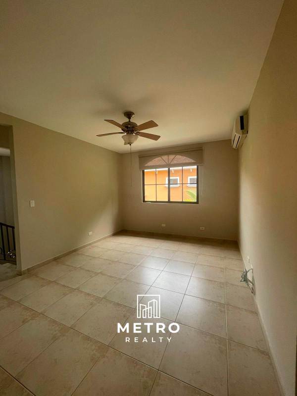 Spacious master bedroom with tile floor AC closet garden views rental house Clayton Panama