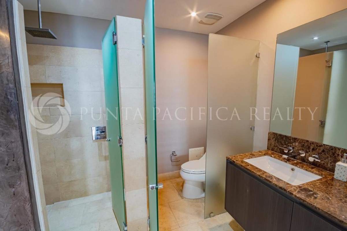 Compact modern granite kitchenette with stainless appliances The Ocean Club Panama