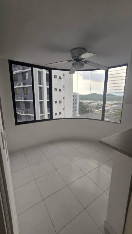 Master bedroom with large window overlooking city view PH Terrazas del Cangrejo Panama