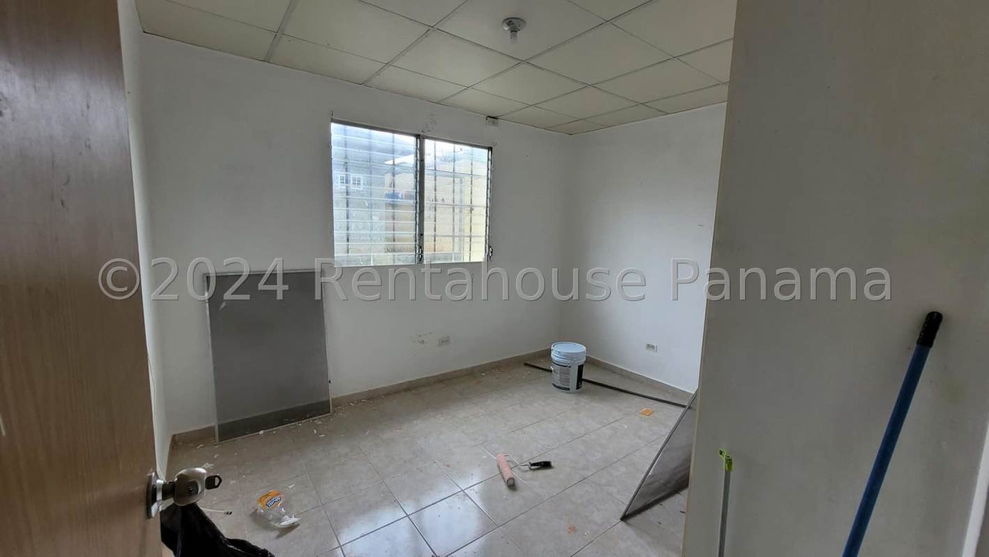 Small bedroom with tiled floor and secure window Pacora Panama