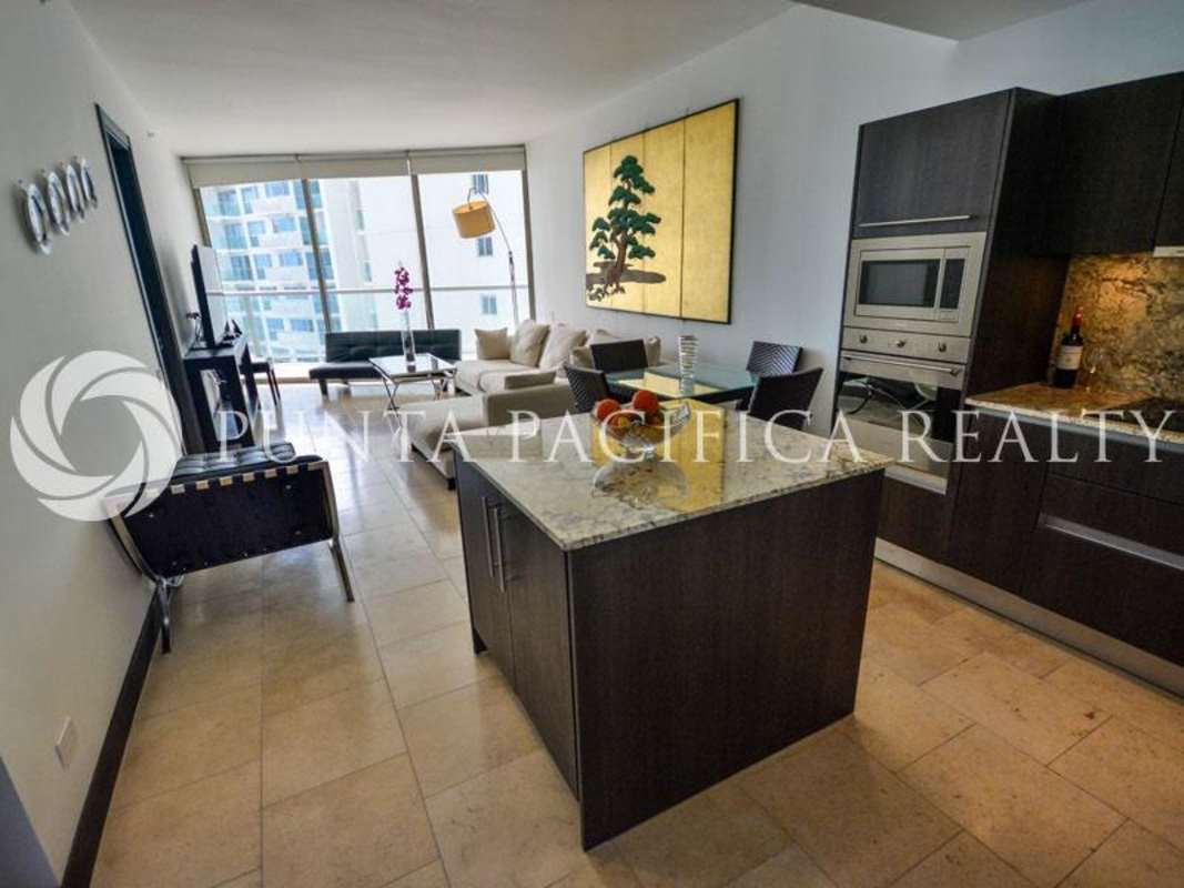 Open living dining area bayloft with city view at The Ocean Club Punta Pacifica Panama