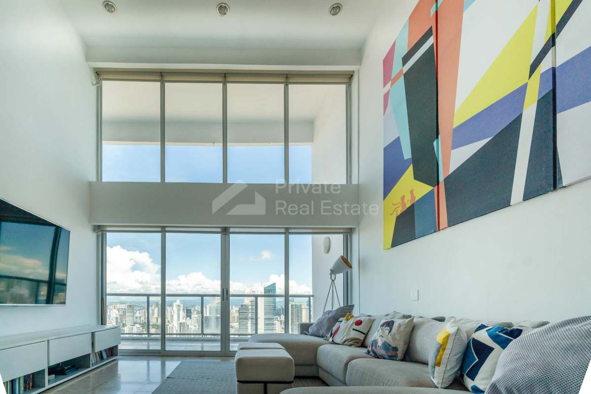Living area with balcony ocean view in duplex PH Destiny apartment Avenida Balboa Panama City