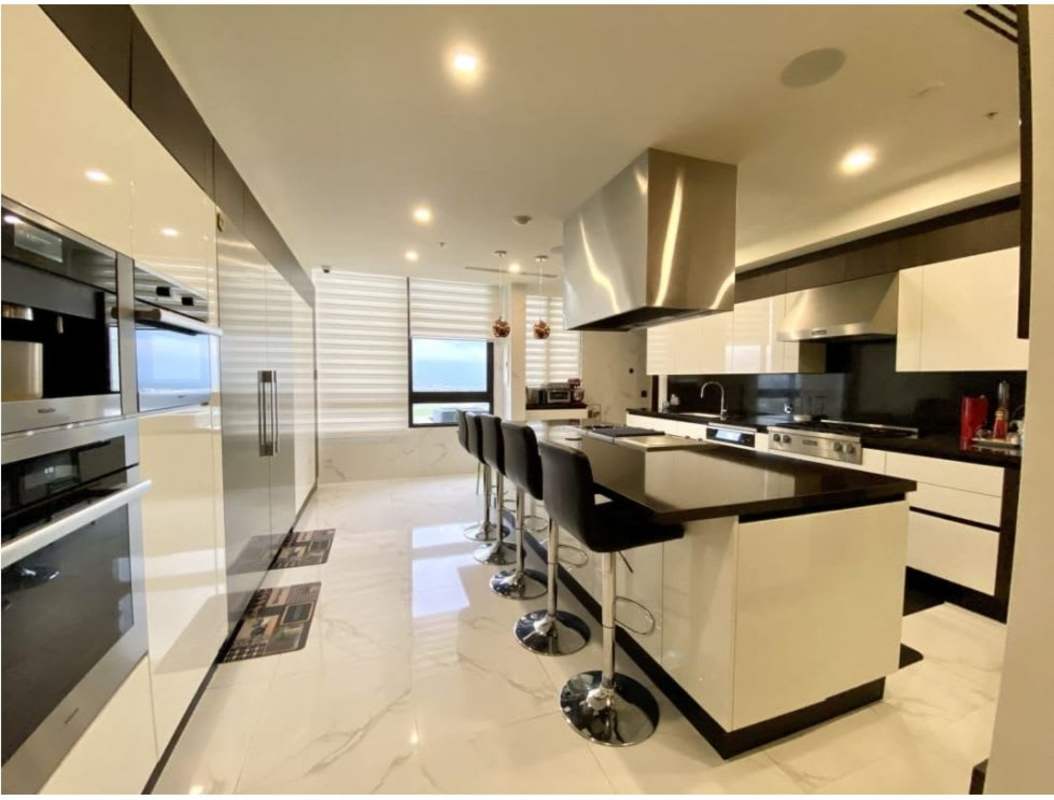 Penthouse terrace with private pool, jacuzzi and BBQ with views of Panama City skyline in Santa María Golf community