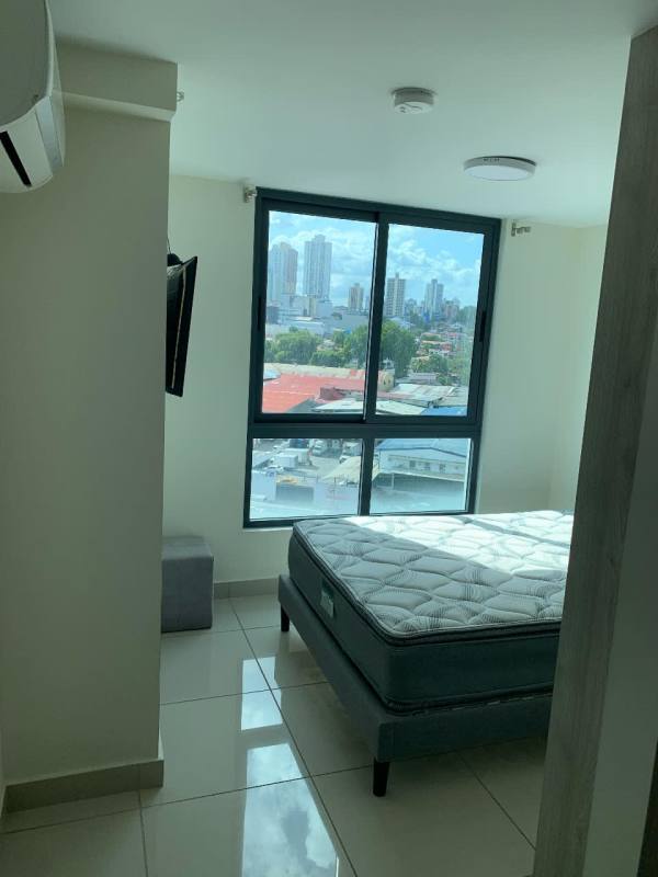 Furnished bedroom with air conditioning, closet and panoramic city views in PH Epoca