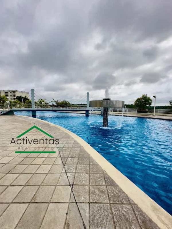 Swimming pool with fountain and gardens at Altamira Gardens Clayton Panama