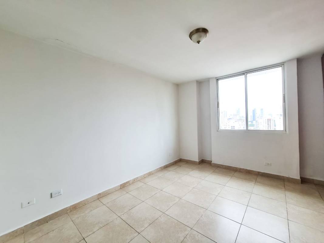 Kitchen with granite countertops, wooden cabinets, ceramic tile walls PH Vivaldi Panama City