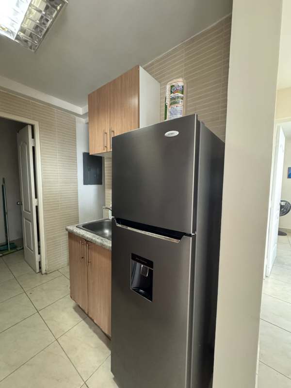 Bright bedroom with large window, view of city, ceramic tiles PH Albrook Point Panama