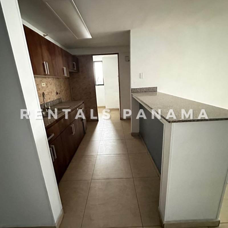 Balcony with tiled floor and city skyline views from apartment in Condado del Rey