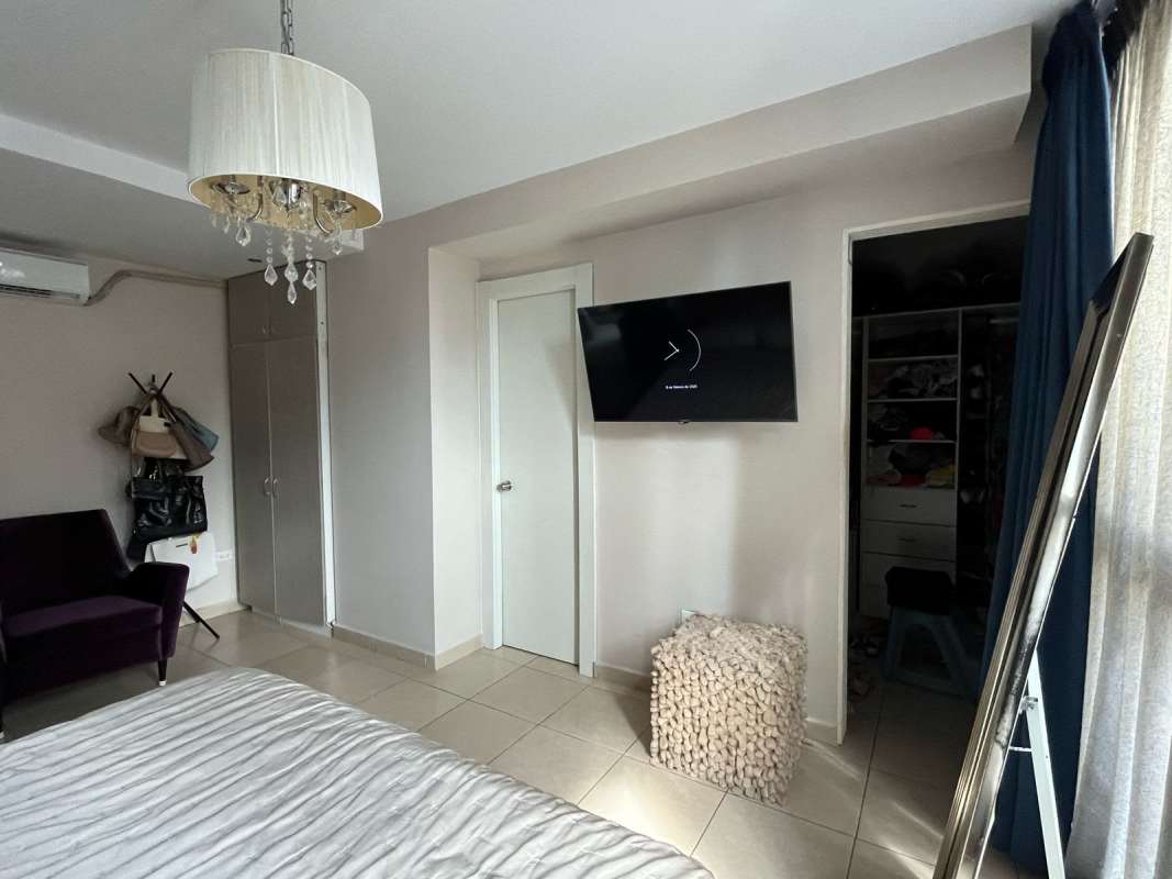 Modern bathroom with glass enclosed shower and mirror PH El Cangrejo Plaza Panama