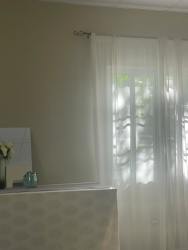 Modern kitchen with granite countertops ceramic tiles in remodeled Montijo house