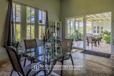 Covered terrace with seating, fruit trees garden views mountain estate Potrerillos Boquete Panama