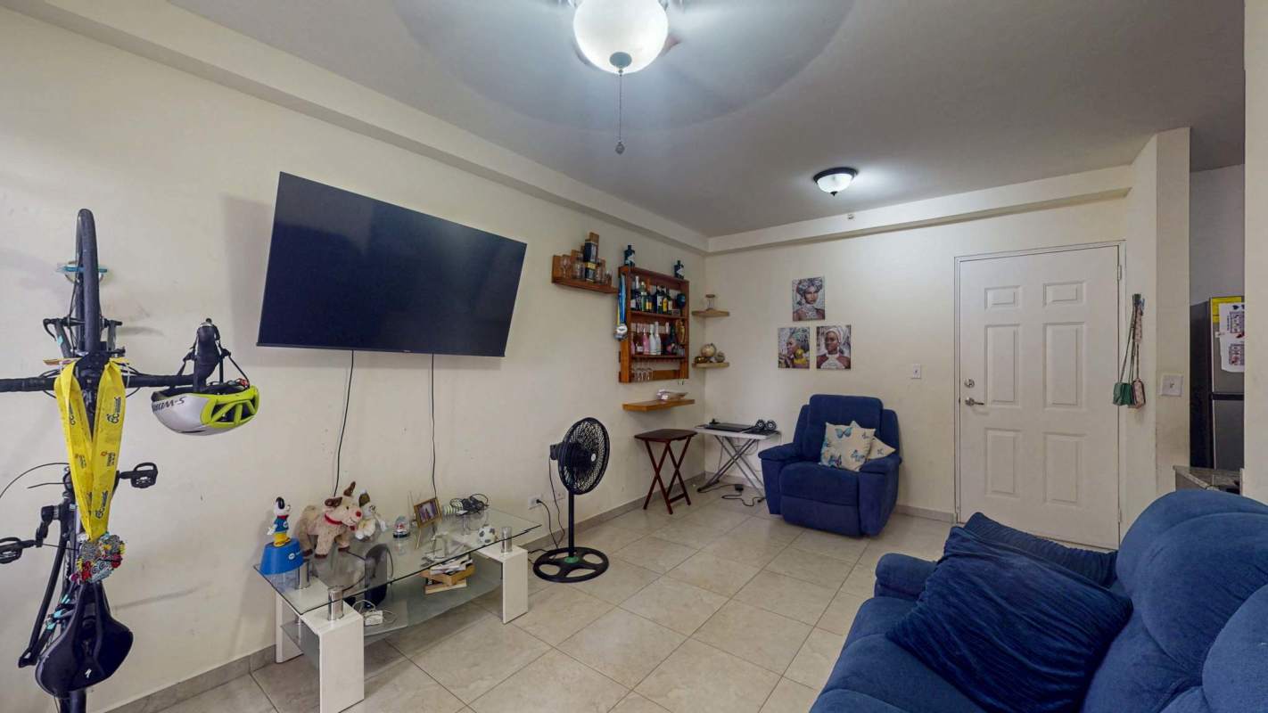 Bedroom with air conditioning, built-in wardrobe and window at PH El Doral Panama City