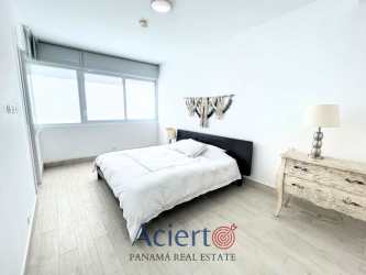 Bright bedroom with large window in beach condo PH Solea Punta Barco Panama