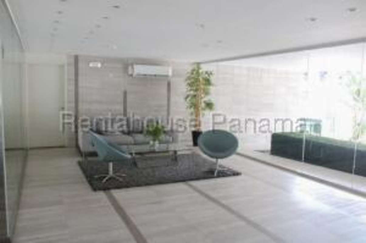 Rooftop pool with sun deck facing Pacific Ocean and skyline at PH Vista Balboa Panama