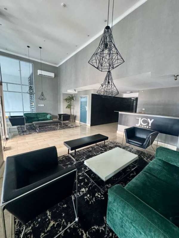 Bright furnished living room with city views at PH Joy Tower San Francisco for rent Panama