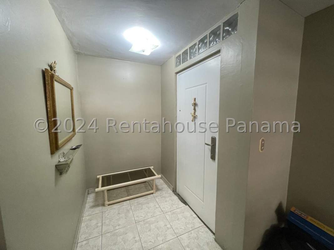 Swimming pool with sun deck and fenced safety area in Betania Panama apartment building.