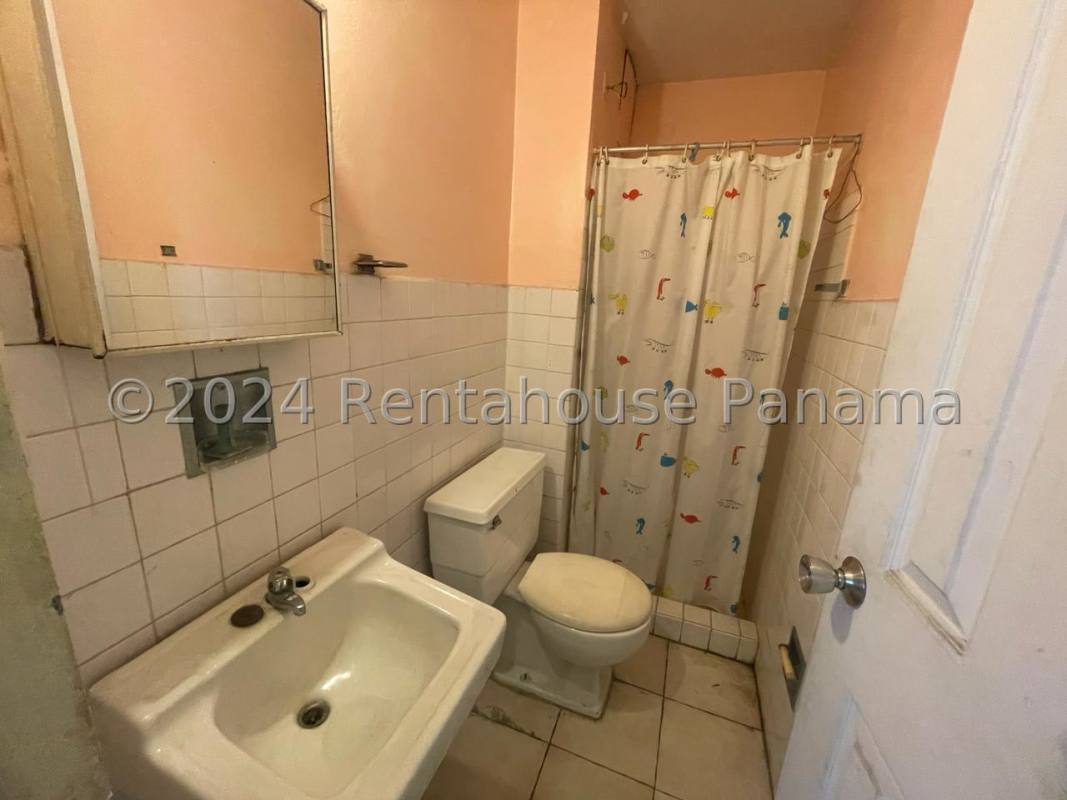 Balcony terrace with tile floor overlooking Betania neighborhood in Panama City.