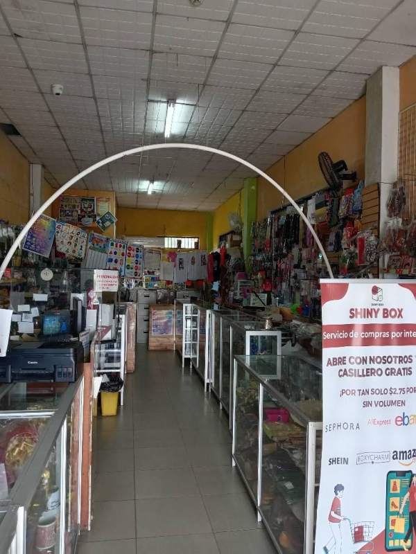 Interior storage or office room with supplies and filing cabinets in Tocumen retail store