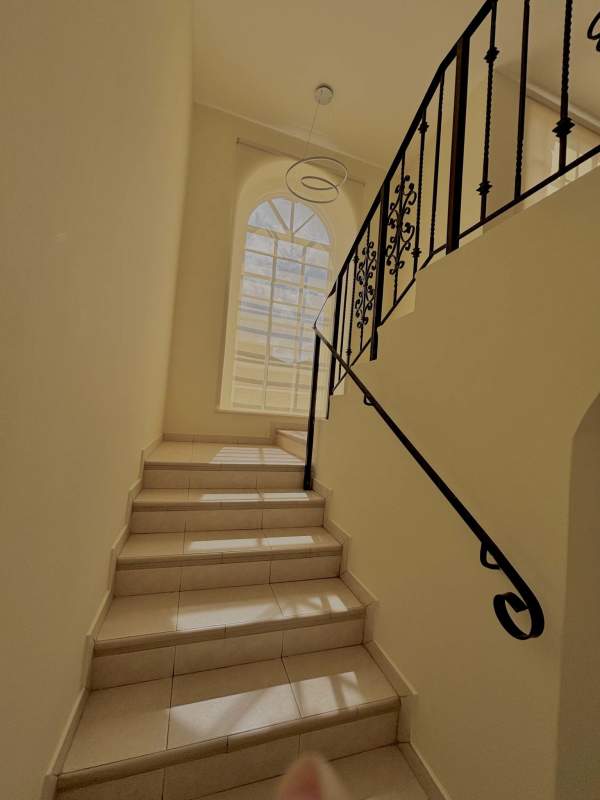 Bedroom featuring large windows, tile floors, built-in closet and AC in Residencial Clayton Village Panama