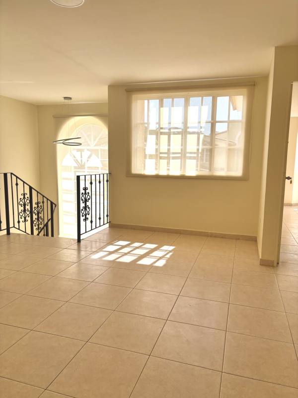 Contemporary bathroom with glass shower and double sink vanity in Clayton house