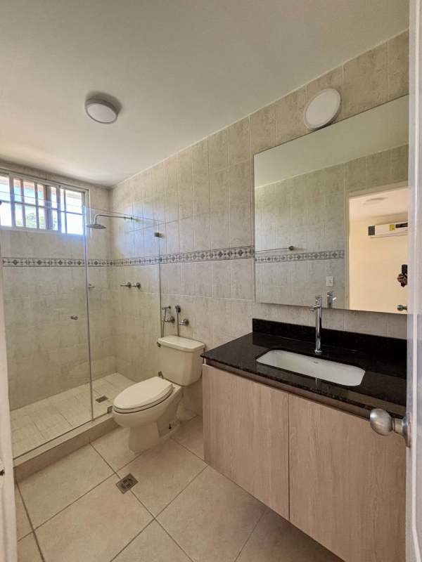 Renovated kitchen with granite countertops and gas stove in Residencial Clayton Panama