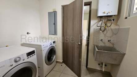 Spacious tiled living room with sliding glass doors to garden Panama Pacifico