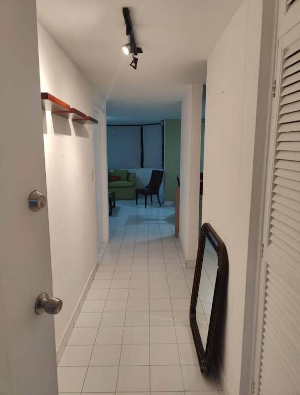 Bathroom featuring blue tiles, vanity sink, walk-in shower in PH El Cangrejo apartment for rent Panama