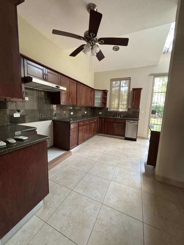Spacious traditional kitchen with wood cabinets granite countertops Embassy Gardens Clayton