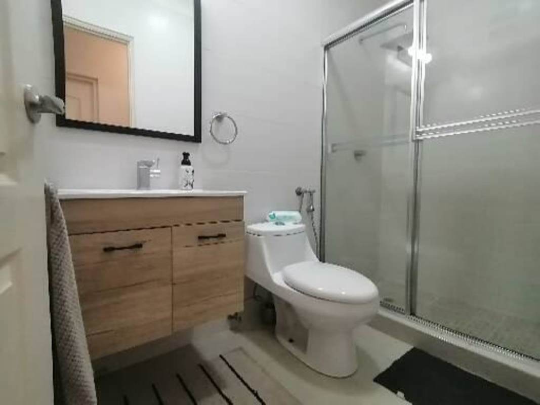 Modern bathroom with glass enclosed shower PH Cangrejo Bay El Cangrejo Panama