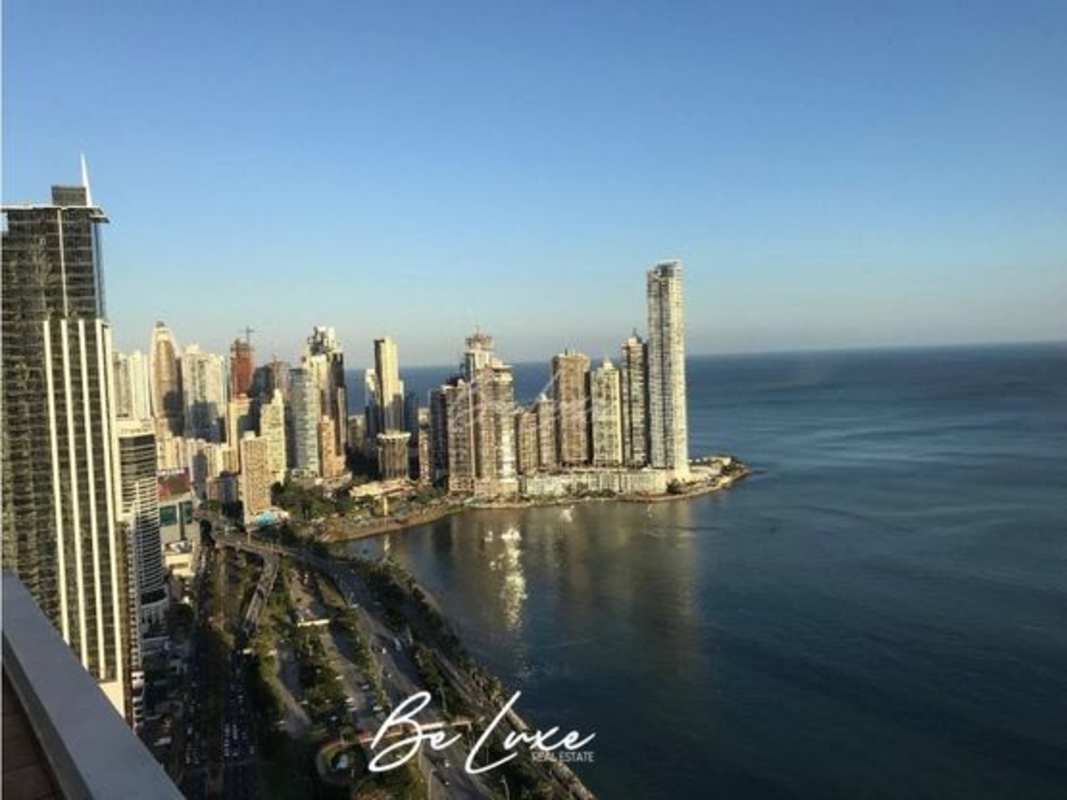 Contemporary kitchen with wood cabinets, granite countertops, appliances at PH Vista Marina Panama