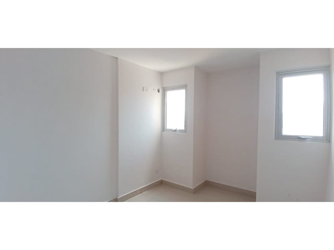 Minimalist kitchen with tile backsplash, cabinetry and gas stove PH Vicky Village Panama