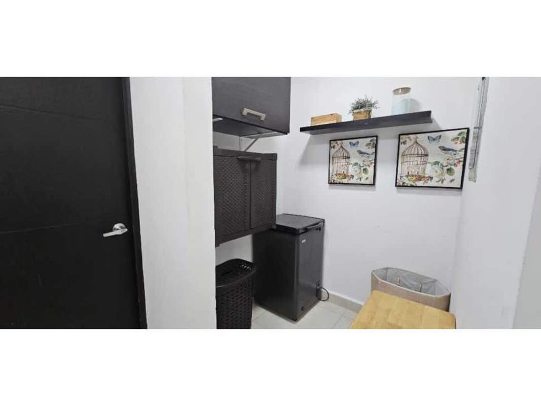 Bright windowed bedroom with built-in wardrobes in furnished Embassy Village apartment Clayton Panama