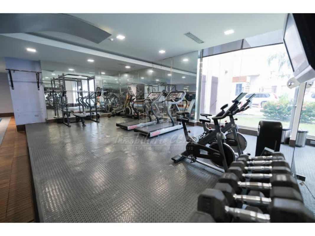 Dining and living space with sofa set and panoramic windows at Loft Four 41 Panama City