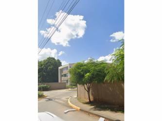 Bright living room with sliding glass doors to balcony, ceramic tiled floors in PH La Sierra Club Residencial
