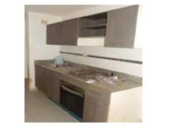 Contemporary fitted kitchen with granite counters and overhead cabinets in PH La Sierra