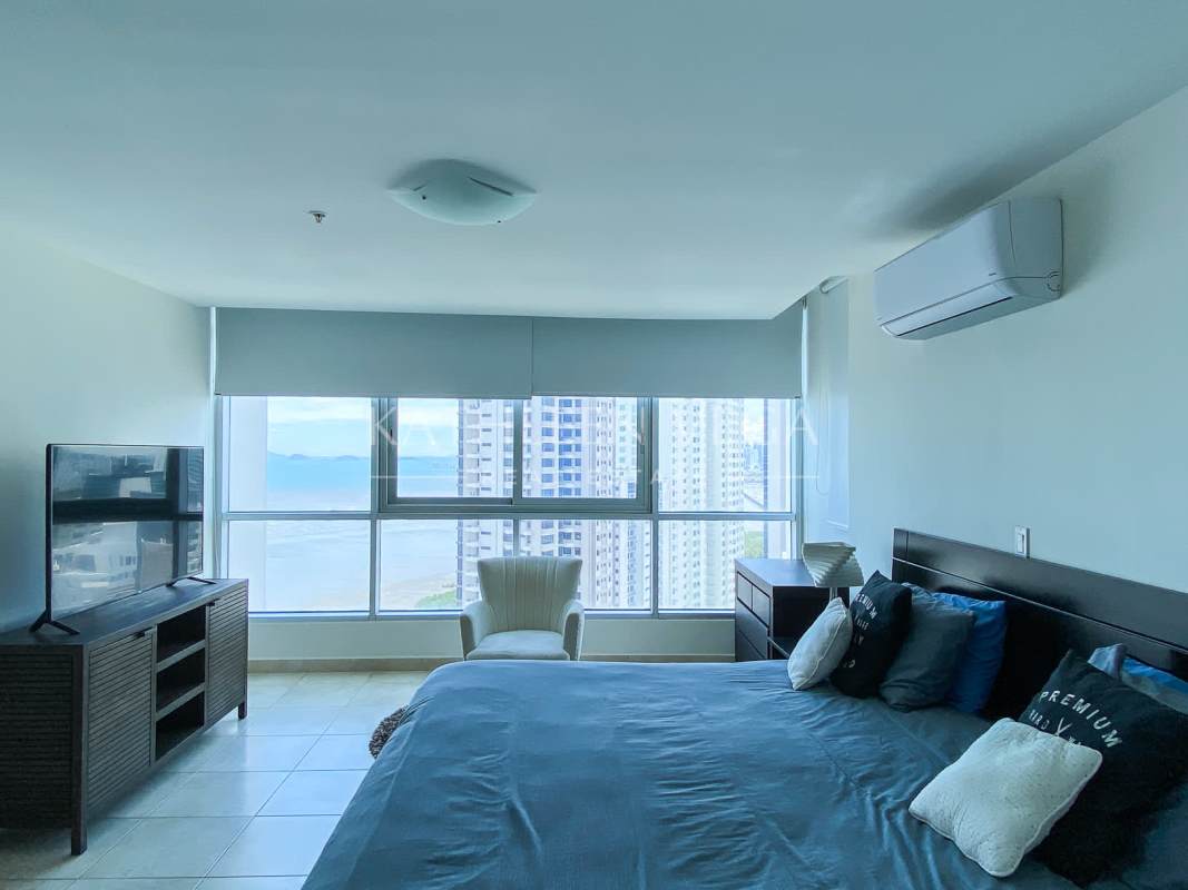 Furnished bedroom with large windows, walk-in closet, AC and sea view in PH Riverside Costa del Este Panama