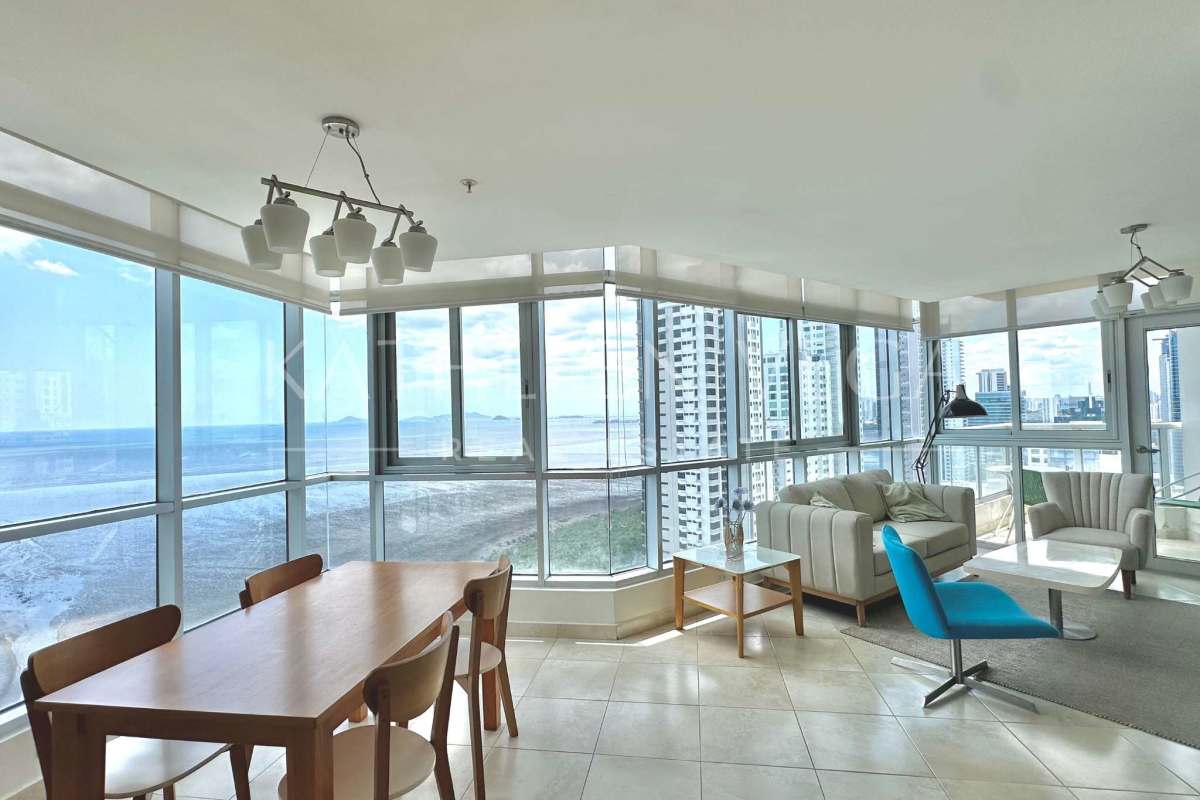 Modern open-plan space with panoramic windows ocean views at PH Riverside Costa del Este