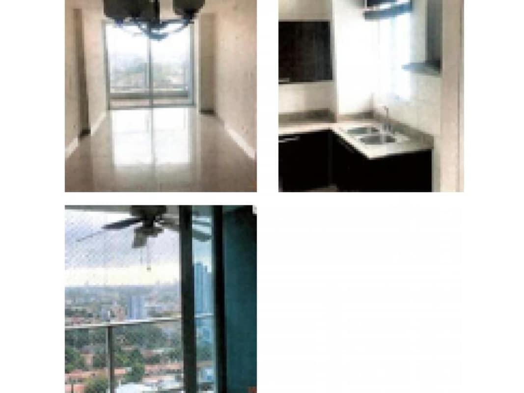Modern apartment view with living area, kitchen corner, glass doors to balcony in PH Victoria Royale