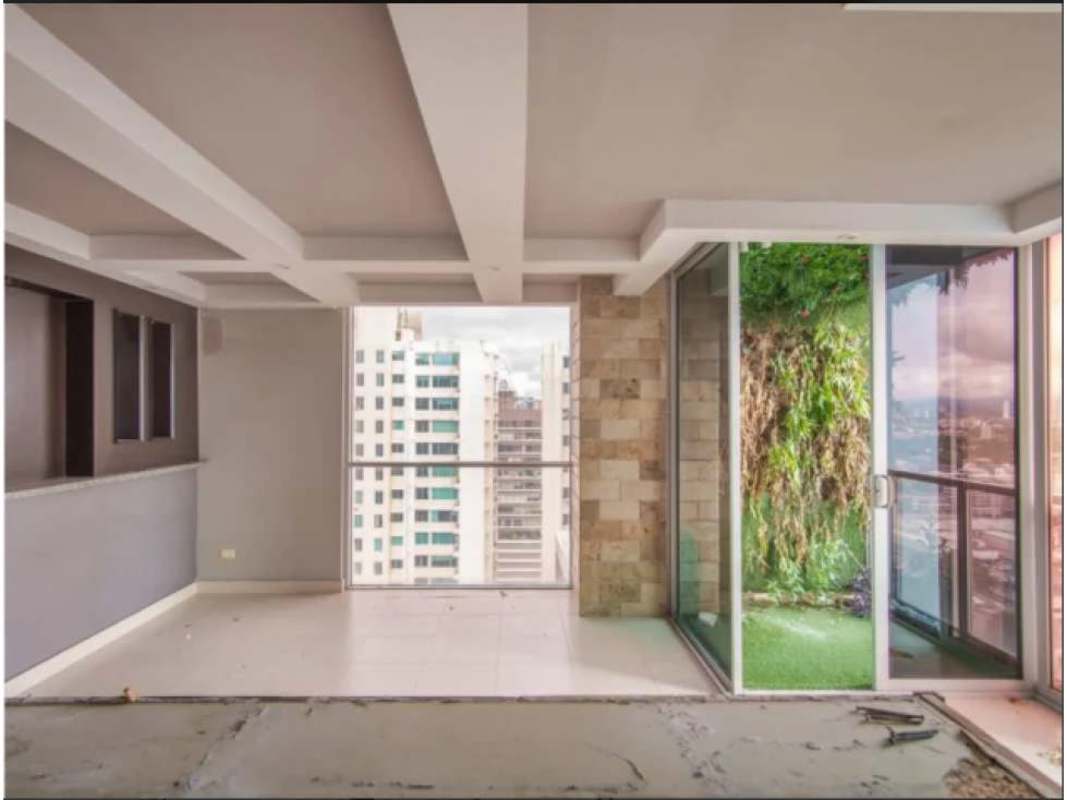 Kitchen in Tao Tower with granite counters and wood cabinets Panama San Francisco