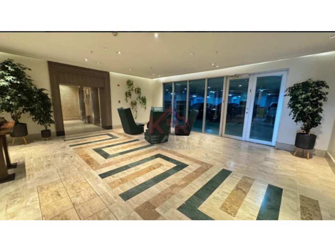 Spacious modern living area with floor to ceiling windows and balcony access Tao Tower Panama City