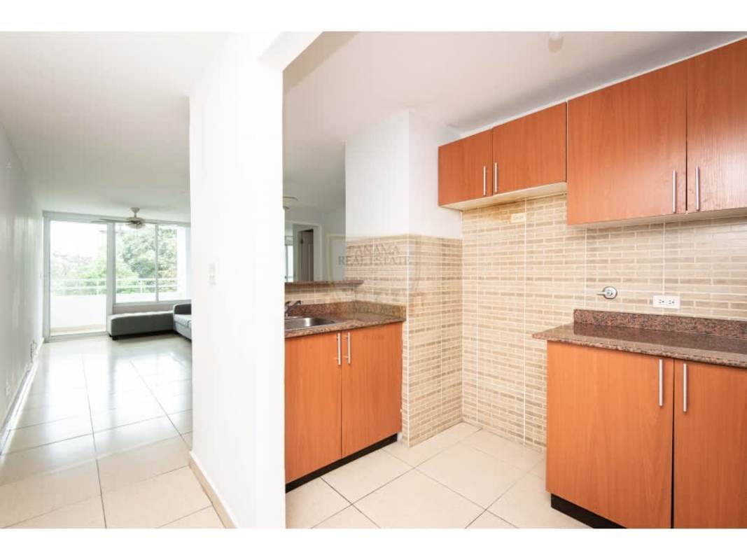 Living-dining area with balcony at PH Carrasquilla Residence near Parque Omar Panama City