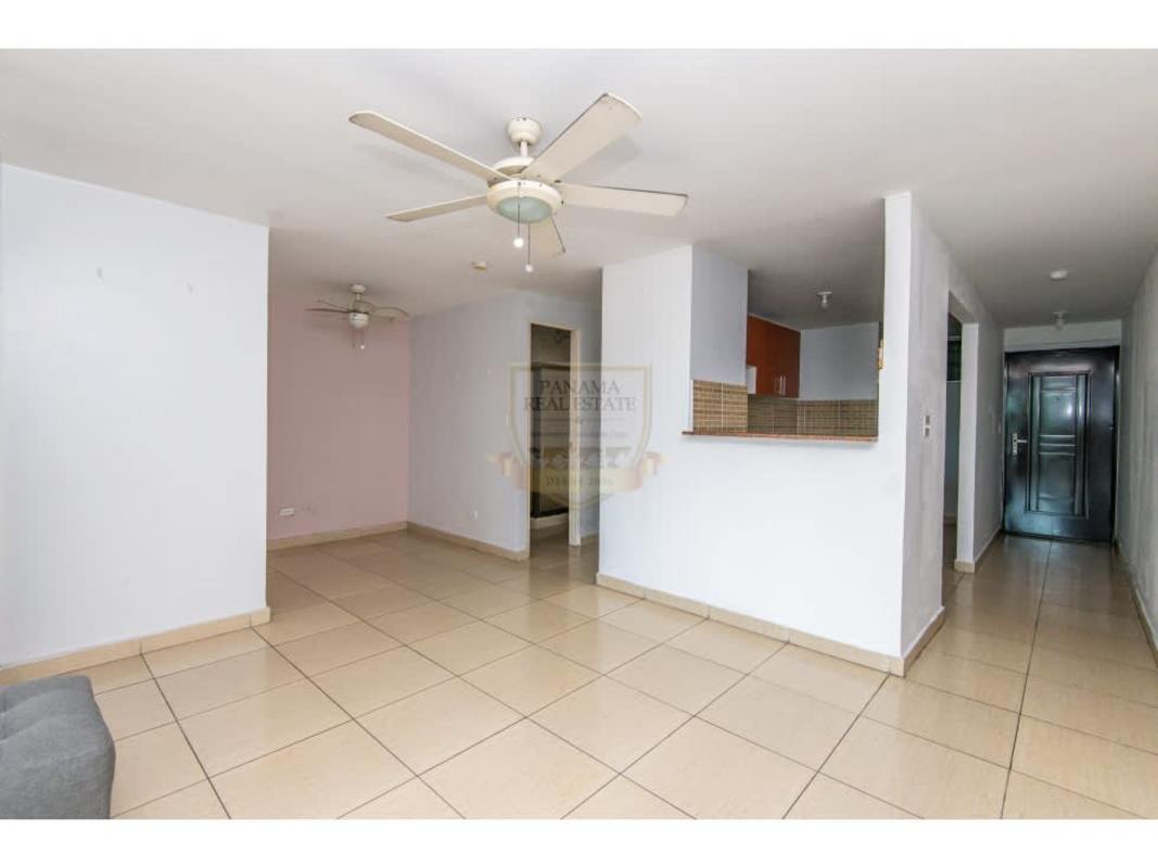 Kitchen with granite counters, wooden cabinets in PH San Francisco Park Carrasquilla Panama
