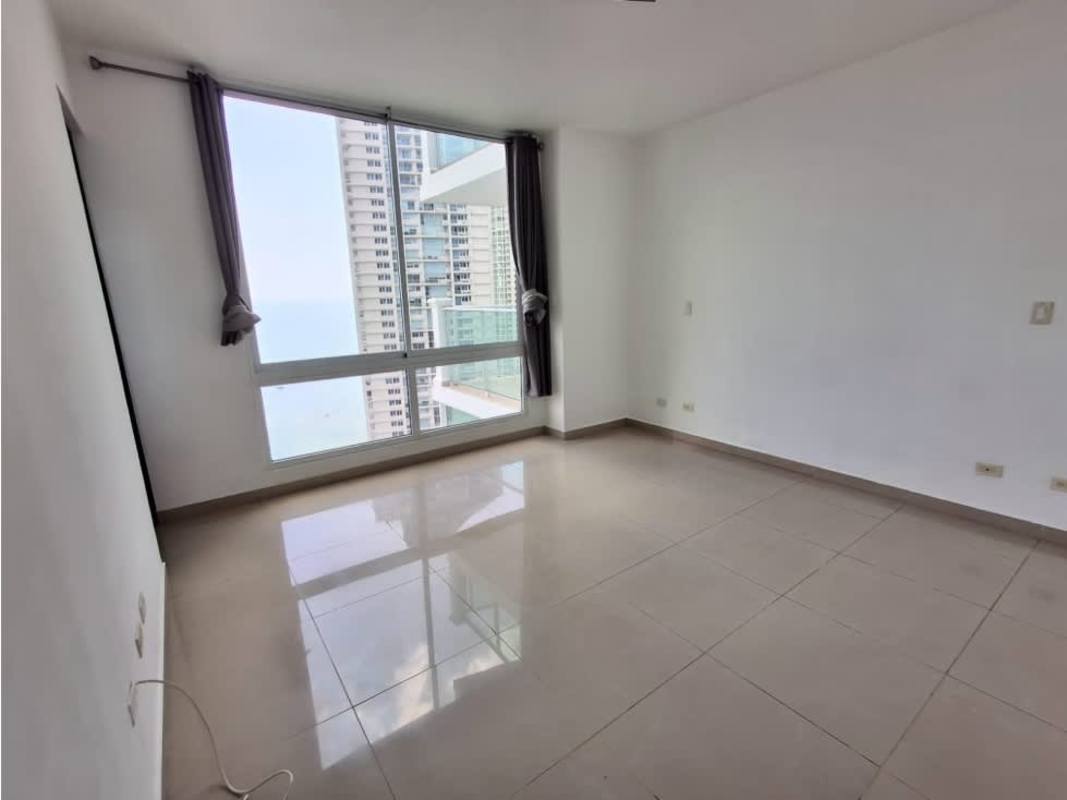 Contemporary kitchen with granite countertops, island, built-in oven at Punta Pacífica Panama