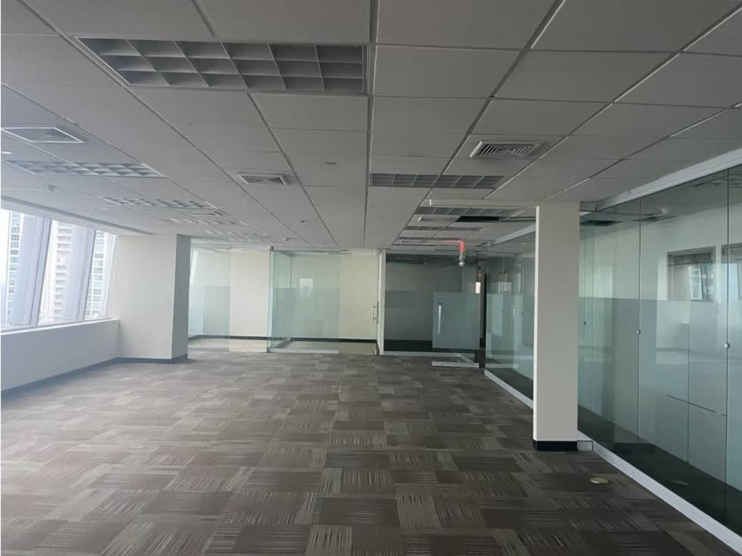 Large open commercial office space with windows and urban view in Torres de las Americas Panama