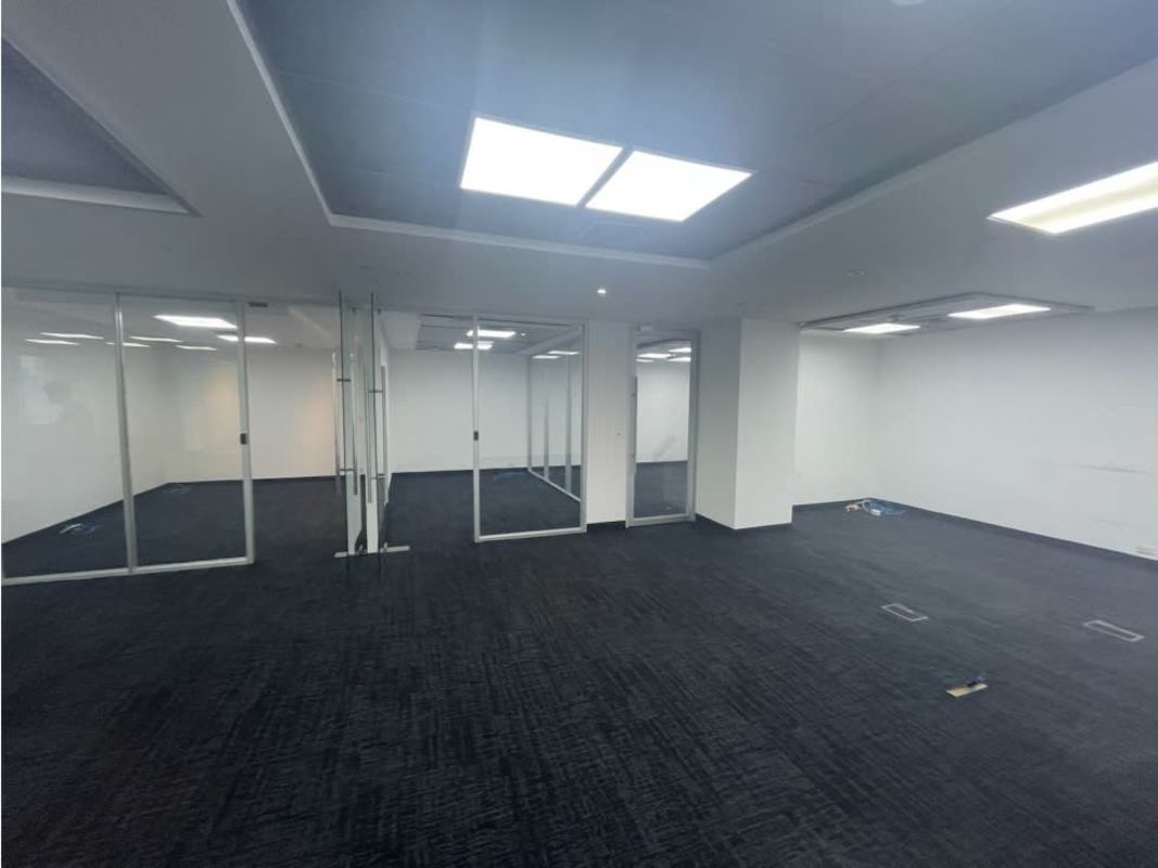 Modern glass-partitioned conference and meeting room in Punta Pacífica office