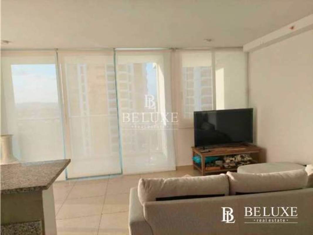 Balcony terrace overlooking Pacific Ocean and Panama City skyline at PH Lumiere Costa del Este