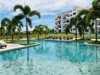 Open plan living and dining room with balcony access in PH Playa del Sol San Carlos Panama